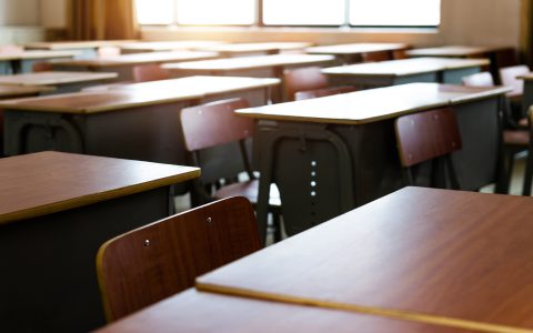 Empty classroom with chairs and desks